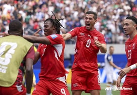 'Substitute card a huge success': Switzerland, with 'Johann Muntari's multi-goal explosion,' crushes Bosnia-Herzegovina 4-1 in a 10-man battle... climbs to top of Group B