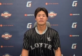 "I was happy to pitch in front of a full house," said Lotte's Japanese right-handed pitcher, who proved his worth with just 68 pitches over two days, facing a bases-loaded crisis in his debut before securing his first hold the next day.