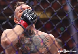 'Shock ending after receiving 45.1 billion won' McGregor's 'return after five years' ended in just 69 seconds... Holloway eager for a third bout with an 'absurd victory' [UFC 329]