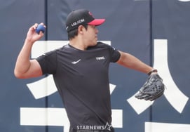 [Foto] Kim Jin-seong: "lanzamiento con determinación"