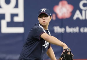 [Photo] Bae Chan-seung, wearing the Taegukgi with trembling hands