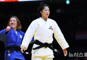She beat her nemesis... Judo's Jang Se-yoon, held back by an opponent she had beaten in all three previous meetings, earns a medal of fighting spirit: 'Endured the pain of a torn pelvis' [Aichi-Nagoya Asian Games]