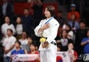 The story behind not being able to sing the national anthem despite memorizing it: "Seeing the Taegeukgi brought tears to my eyes, and memories of difficult times came flooding back" — Judo 57kg class triumph [Aichi-Nagoya Asian Games]