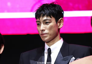 He weathered the 'drug scandal' too… T.O.P's 20-year fanbase turns away, prompting belated barn-fixing [Star Issue]