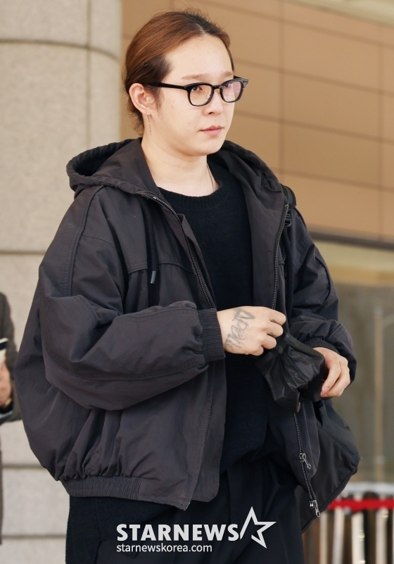 Nam Tae-hyun, a former member of WINNER on charges of violating the Road Traffic Act, is leaving the court after being sentenced to prison at the second trial date held at the Seoul Western District Court on the 12th. /Photo = Reporter Kim Hwi-sun