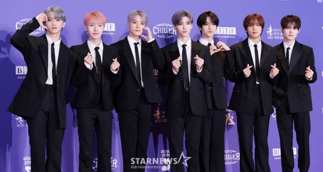 그룹 엔시티 드림(NCT DREAM)이 14일 오전 서울 송파구 롯데시네마 월드타워에서 열린 정규 5집 'Go Back To The Future(고 백 투 더 퓨처)' 발매 기념 포토월에서 포즈를 취하고 있다. /2025.07.14 /사진=김휘선 hwijpg@