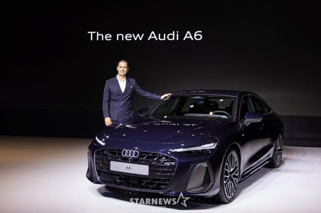 新車A6とマルコ·シューベルトアウディAG取締役会メンバー、セールス·マーケティング総括/写真提供=アウディ·コリア