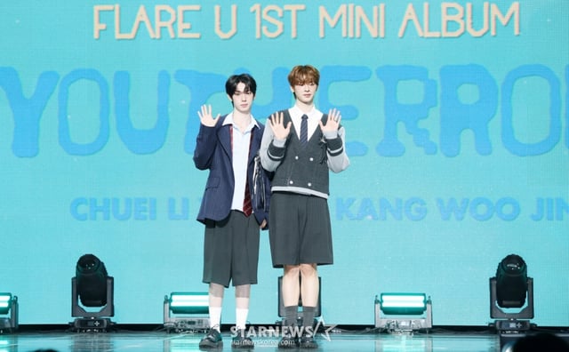 그룹 플레어 유가 13일 서울 용산구 블루스퀘어에서 진행된 첫 번째 미니앨범 'YOUTH ERROR' 발매 기념 쇼케이스에서 포즈를 취하고 있다. /2026.05.13 /사진=김휘선 hwijpg@