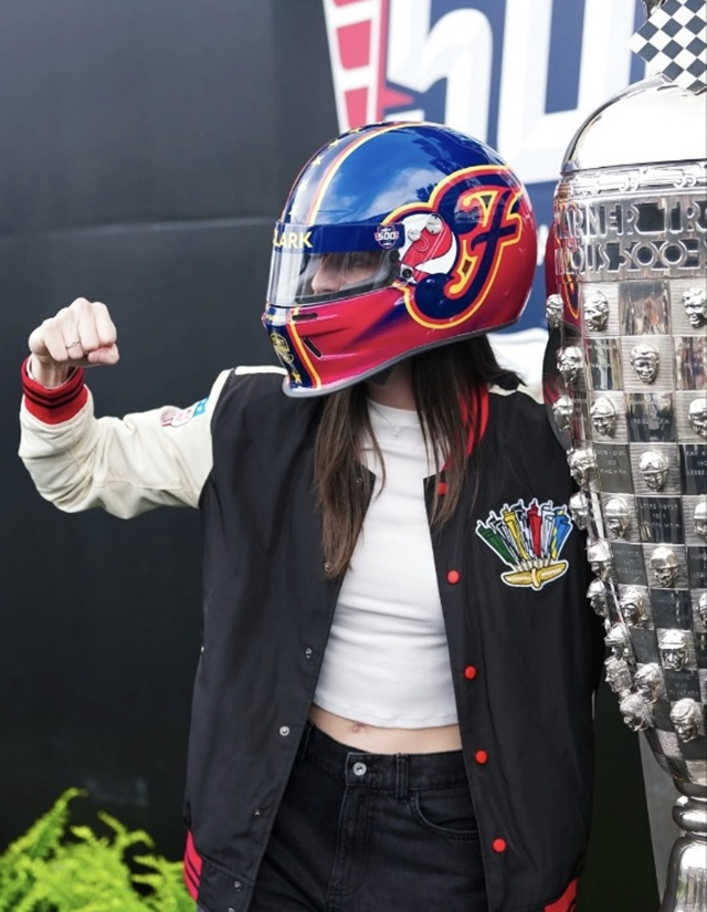 'Caitlin Clark attending the Indy 500 event wearing a custom helmet. /Photo=Indiana Fever SNS