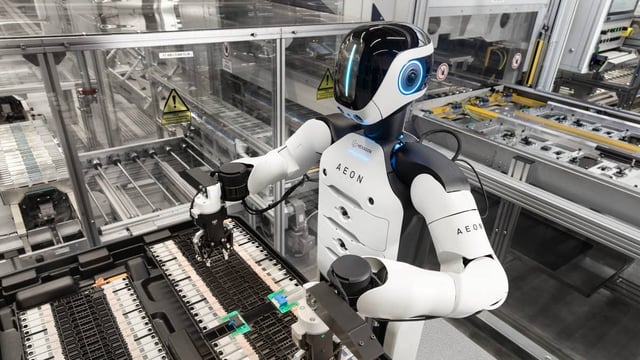 Humanoid Robots Inside an Automotive Factory
