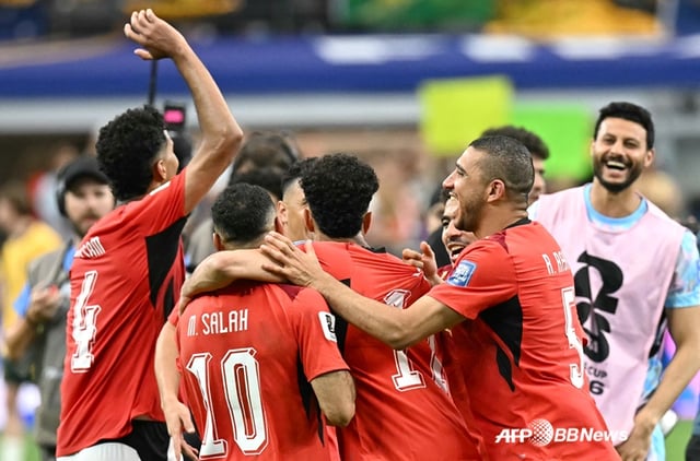 Egyptian players celebrate. /AFPBBNews=NEWS1