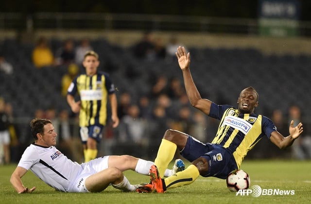 Usain Bolt (right). /AFPBBNews=NEWS1