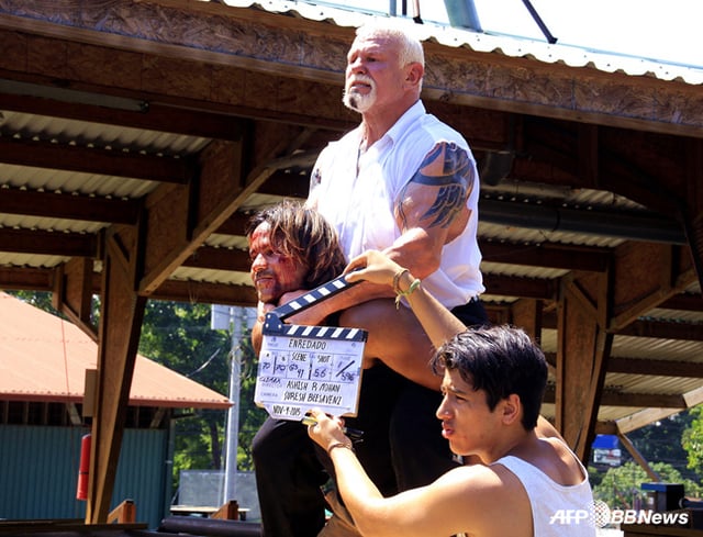 WWE legend Scott Steiner (top). /AFPBBNews=NEWS1