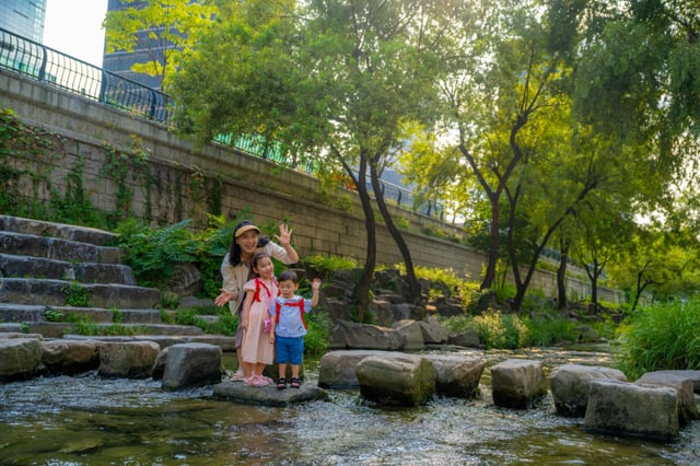 A faint light seeps through Cheonggyecheon.