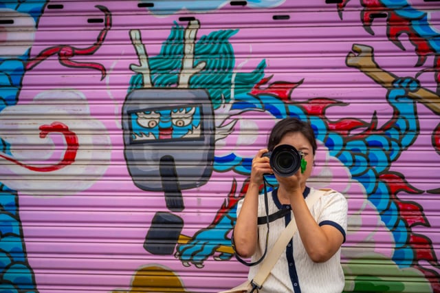 Snap photo with the shutter mural of Moonrae Ironworks as the background.