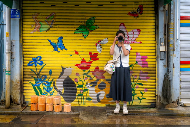 Snap photo with the shutter mural of Moonrae Ironworks as the background.