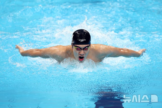 On the 22nd at Tokyo Aquatics Centre in Koto Ward, Tokyo, South Korea's Kim Min-seop competes during the preliminary heats of the men's 400m individual medley at the 2026 Aichi-Nagoya Asian Games. /Photo=NEWSIS