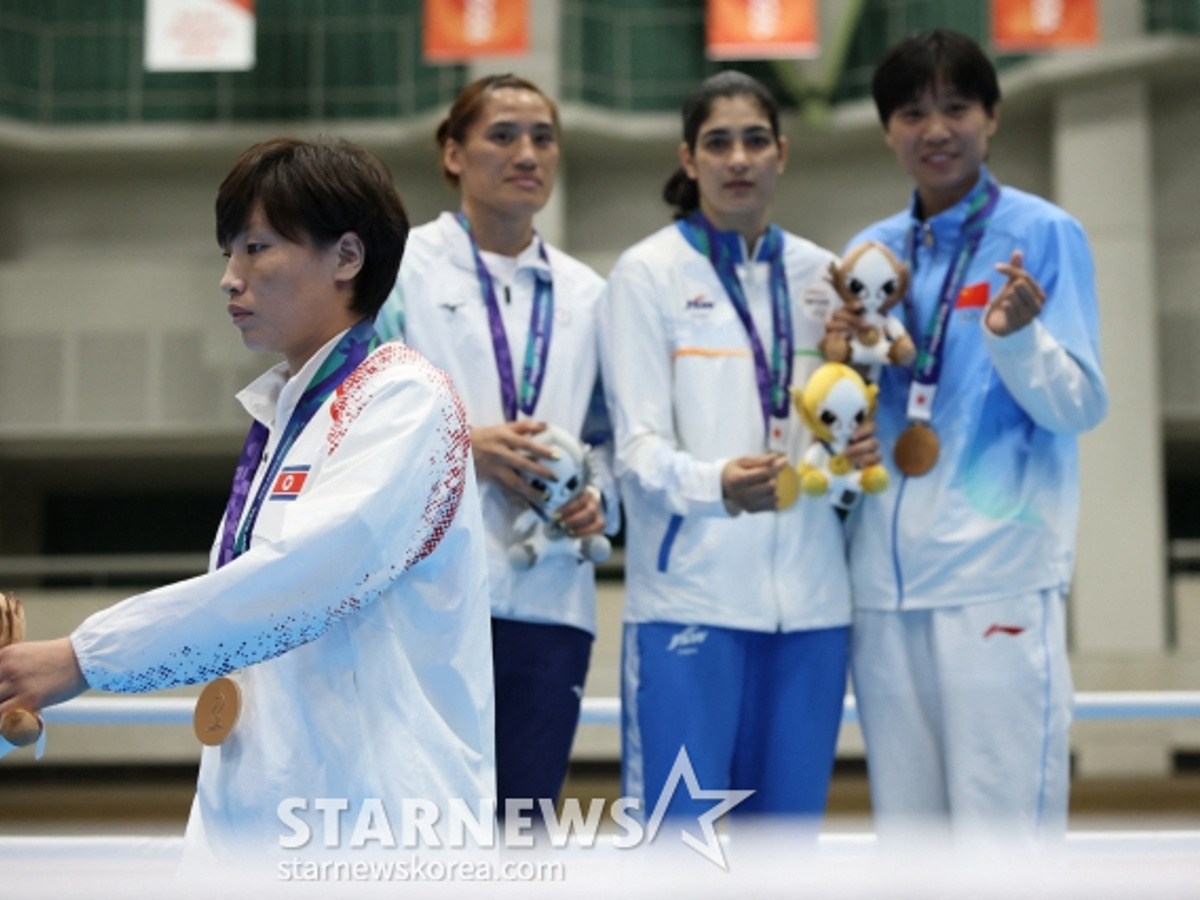 写真撮らないで！「ボクシング銅メダル北朝鮮選手の紀行、回答拒否